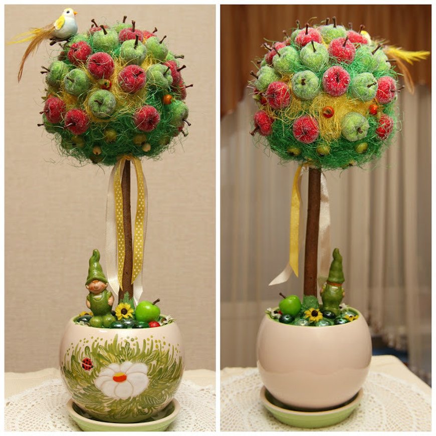 Искусственные яблочки, груши, апельсины и грозди винограда.